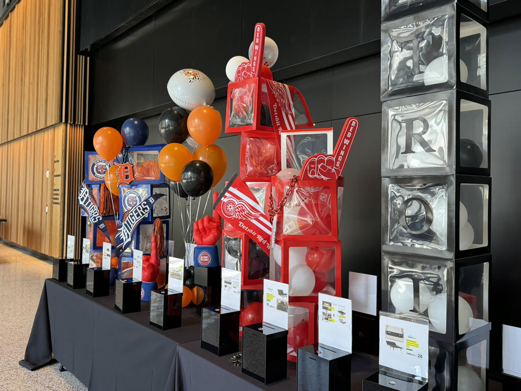 Detroit sports acrylic display with orange and blue balloon bouquets